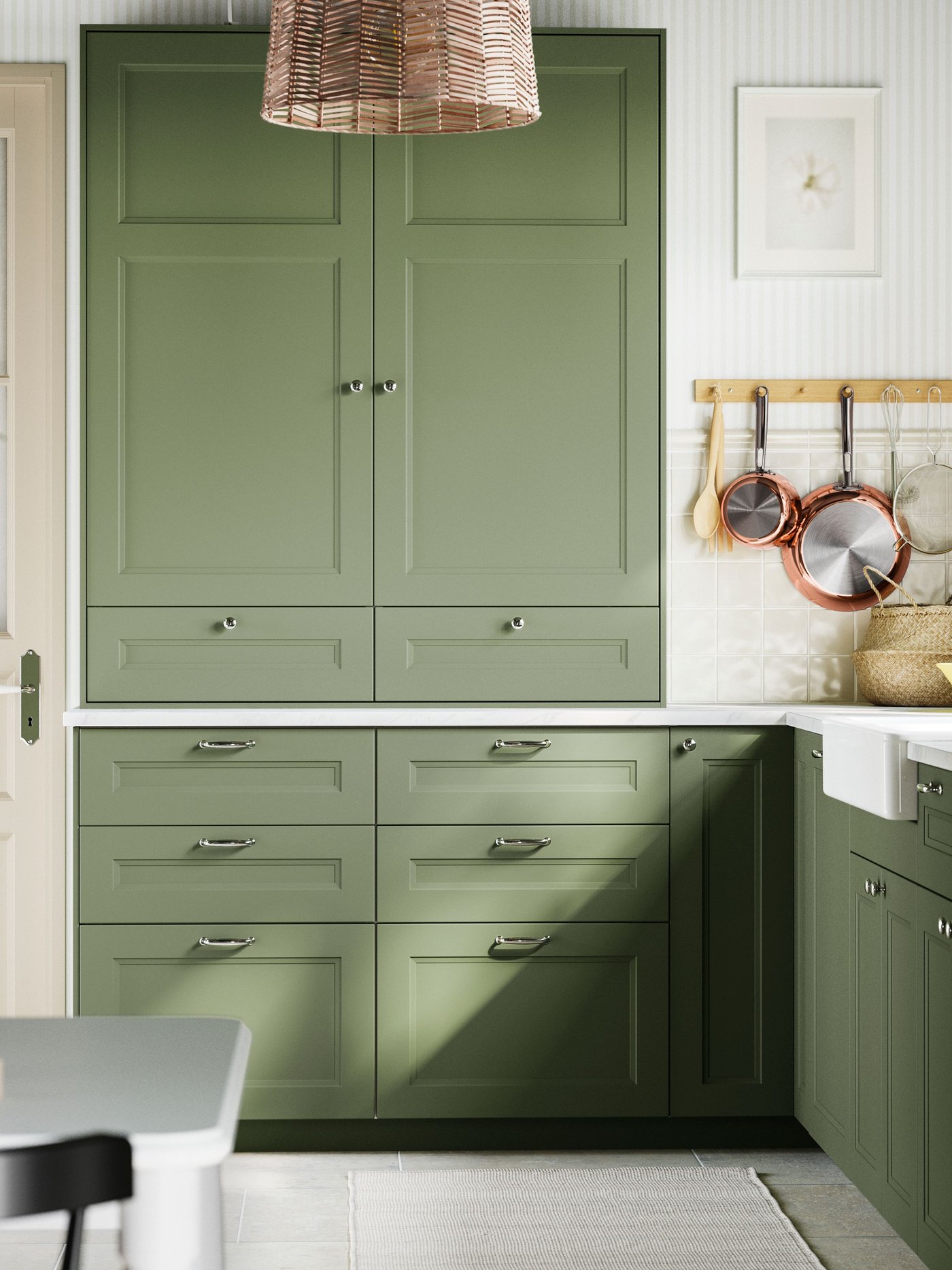 A grey-green AXSTAD door in the kitchen