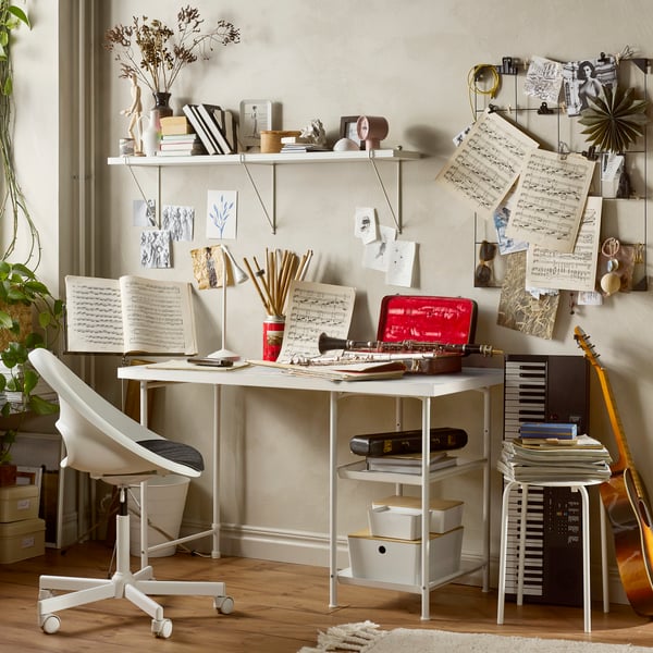 A grid/multicolour white LAGKAPTEN desk