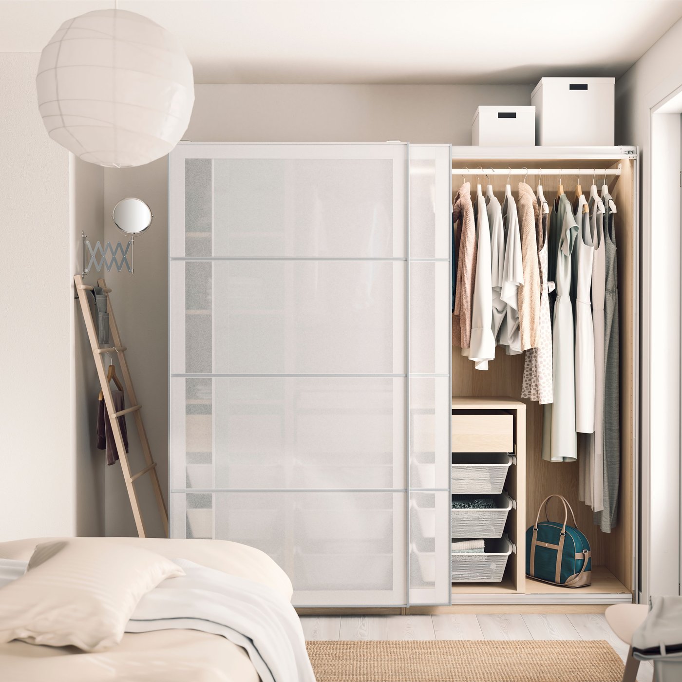 A white TJENA storage box with lid