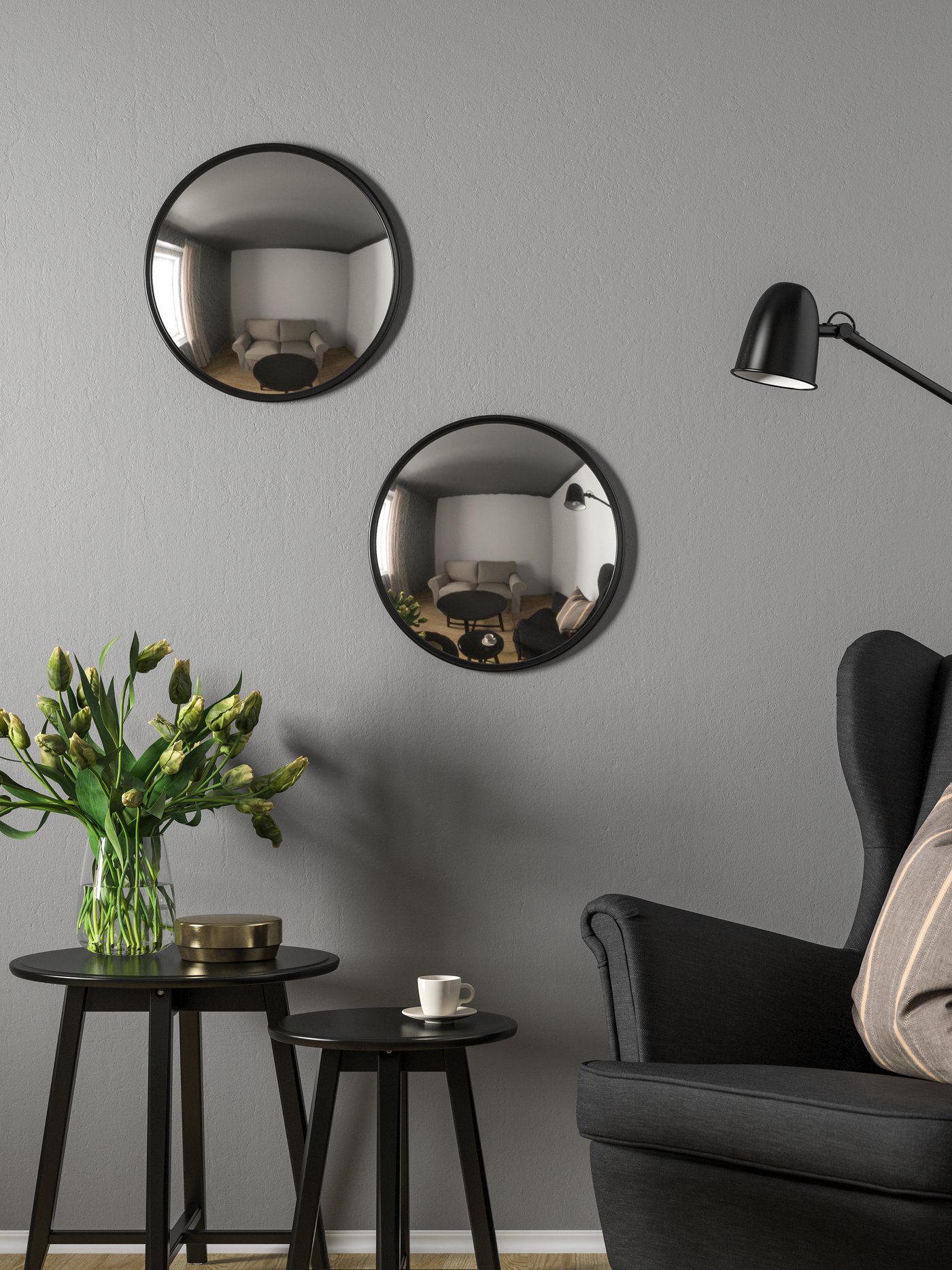 A black SVARTBJÖRK decorative convex mirror