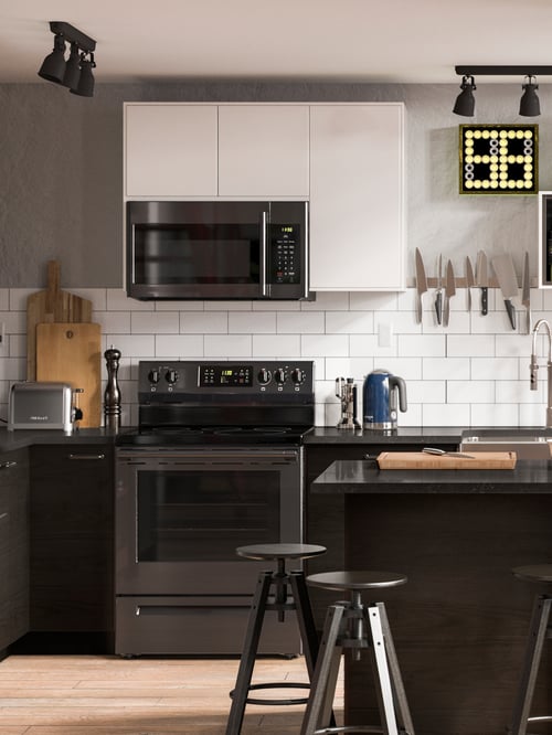 A kitchen featuring a white wall cabinet with 2 doors and adjustable shelves, placed next to a ceiling track with 3 spots. 