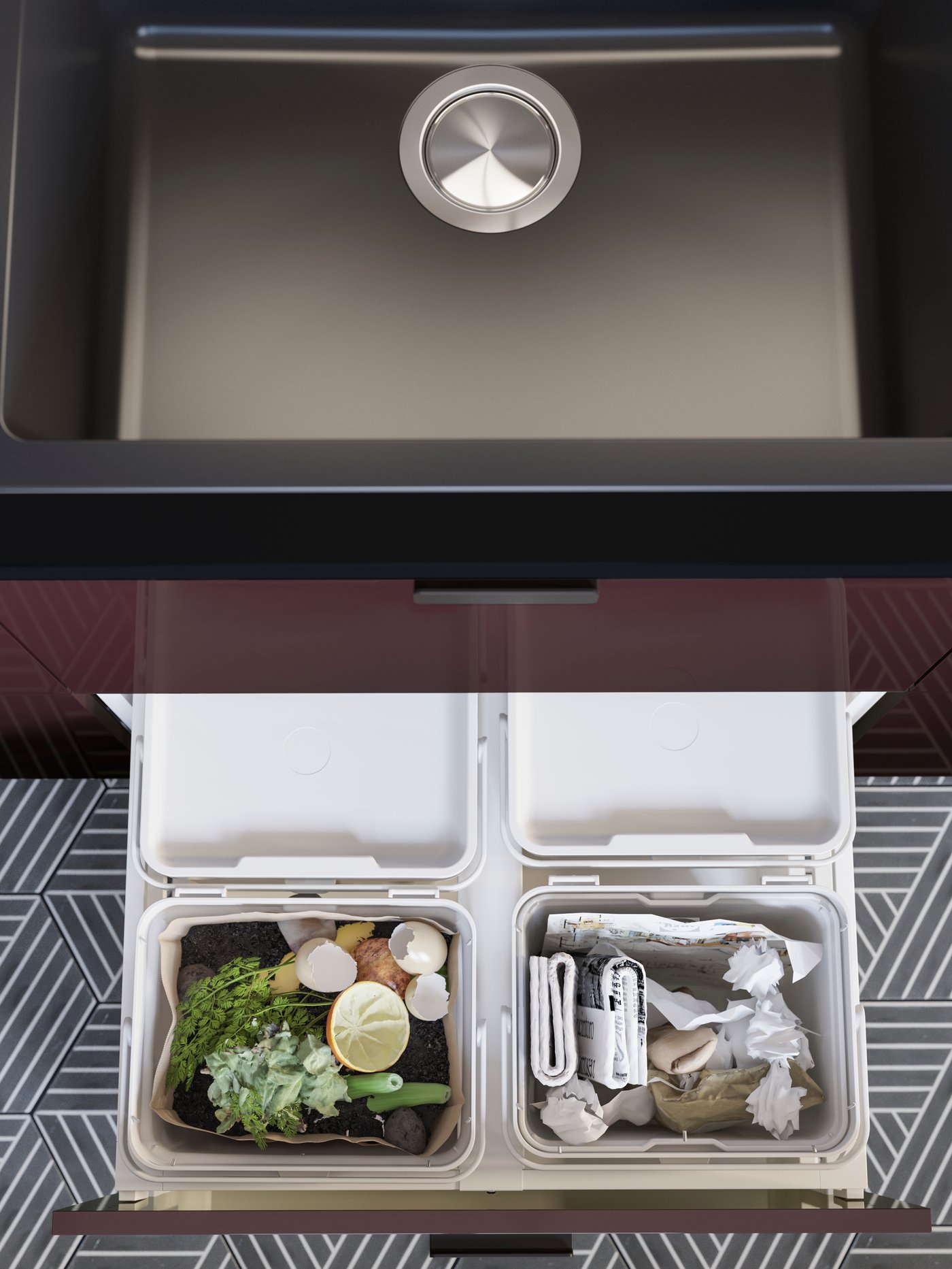 An open kitchen drawer with a light grey HÅLLBAR waste sorting solution containing food waste and paper for recycling.