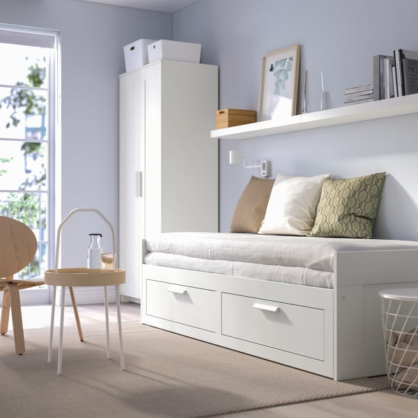A white BRIMNES day-bed frame with 2 drawers