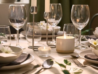 A silver-colour SILVERPÄRON candlestick for 2 candles