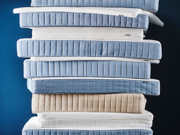 A white NISSEHOLM mattress pad