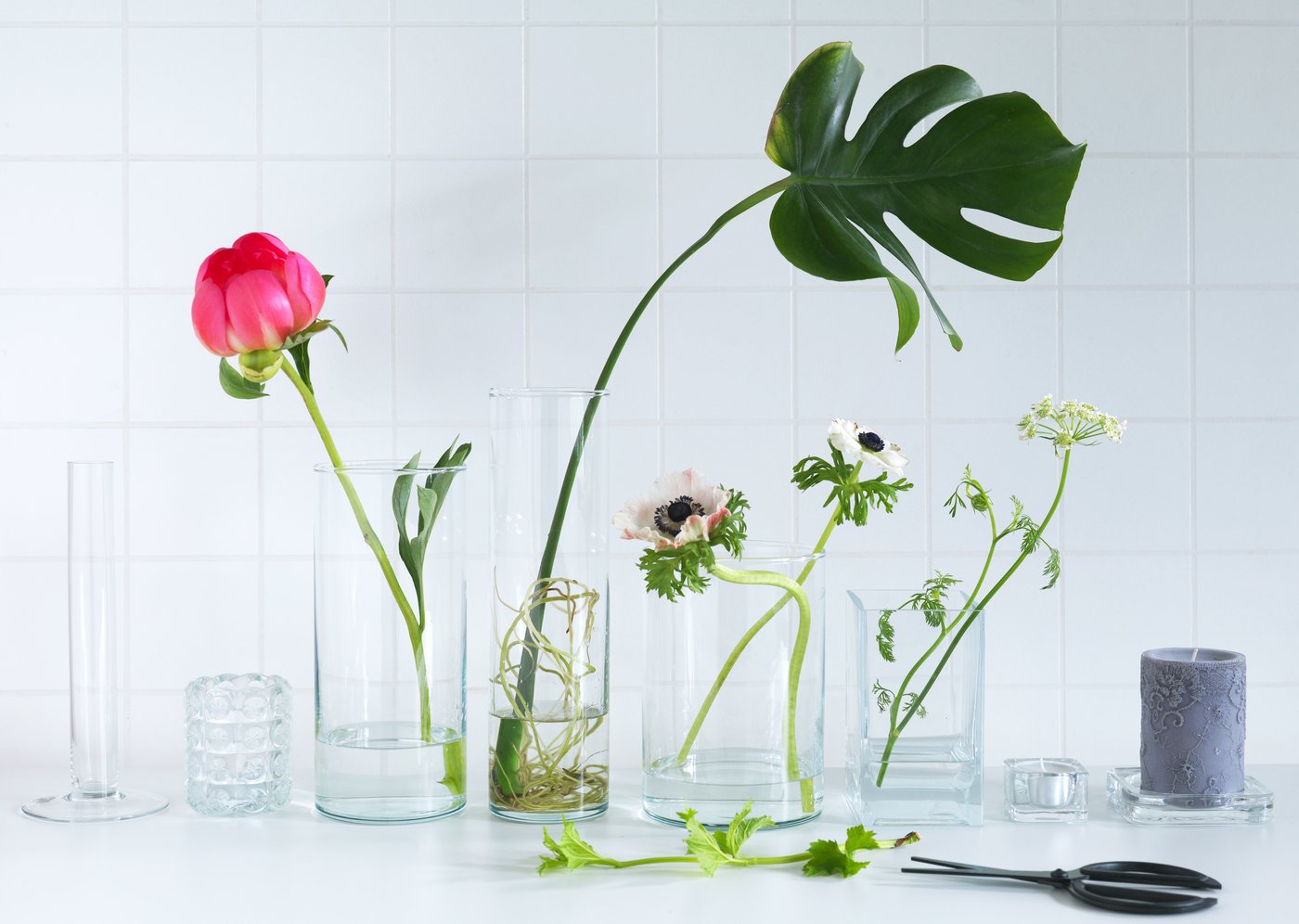 A clear glass TAJT vase