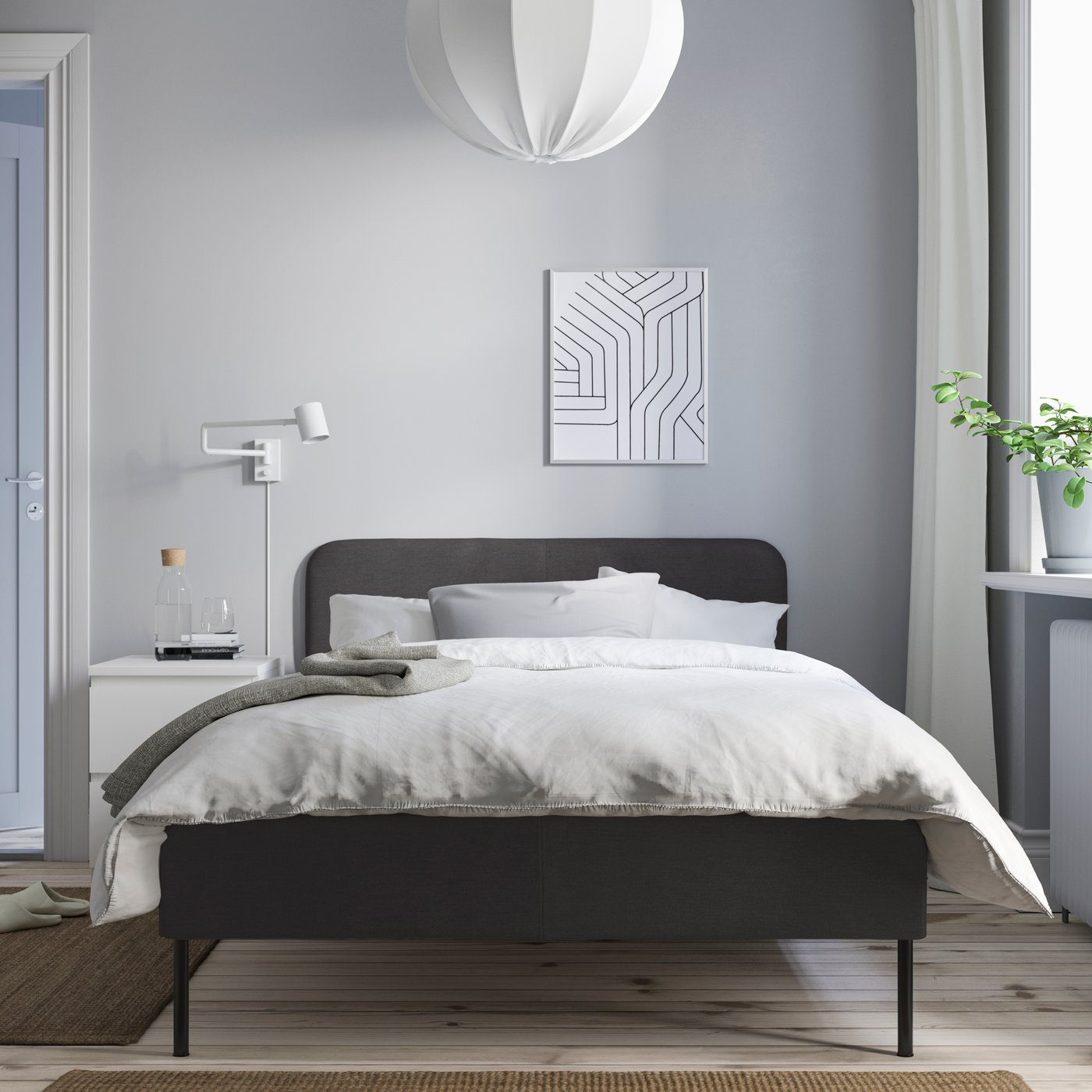 A Vissle dark grey SLATTUM upholstered bed frame