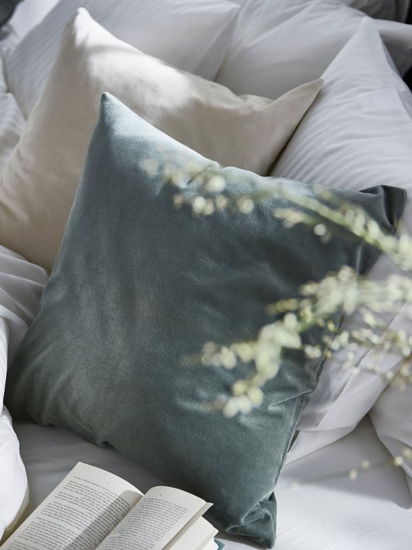 A grey-green SANELA cushion cover