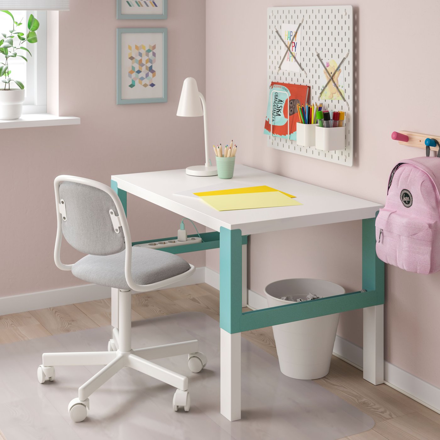 A white/turquoise PÅHL desk