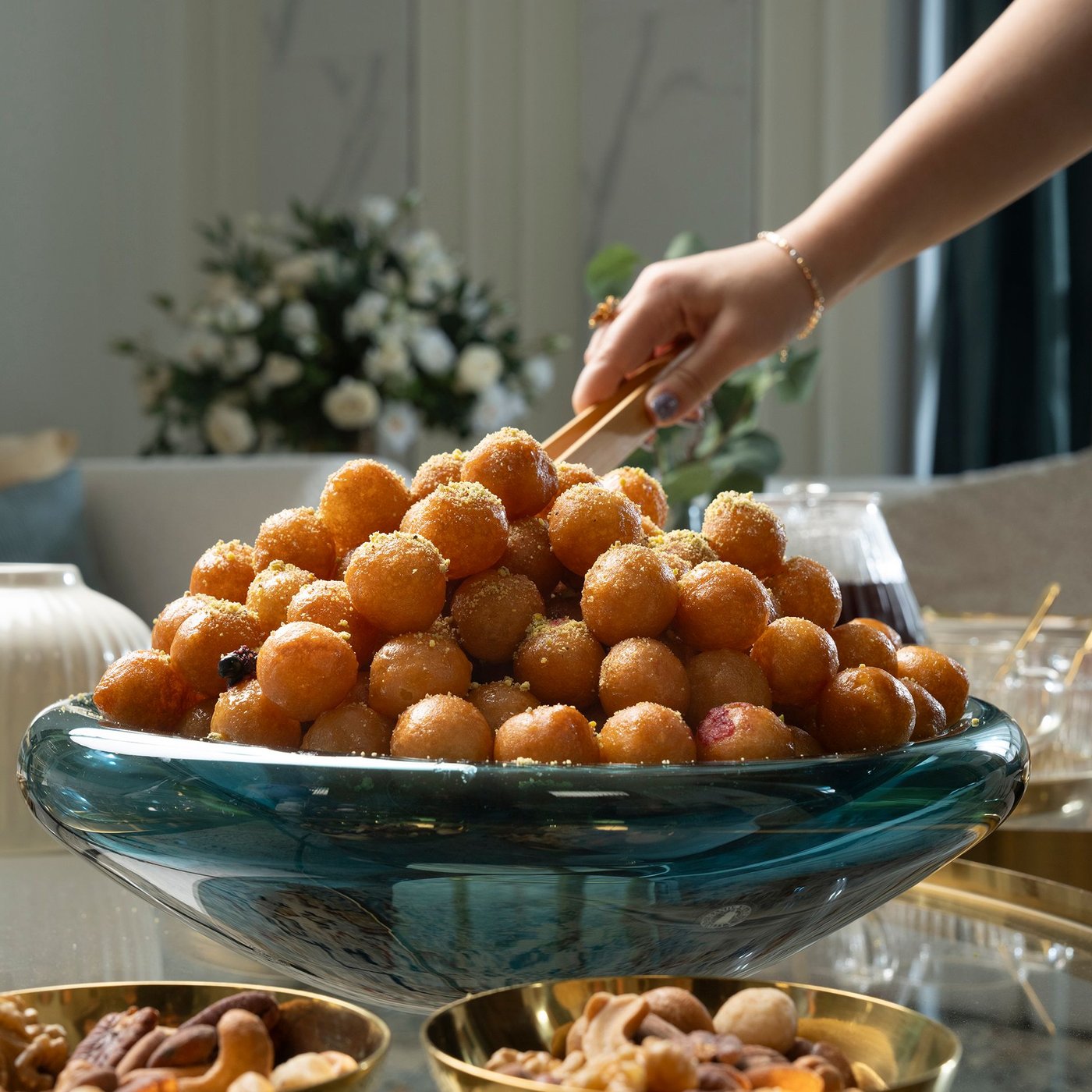 A gold effect/glass TORSJÖ coffee table