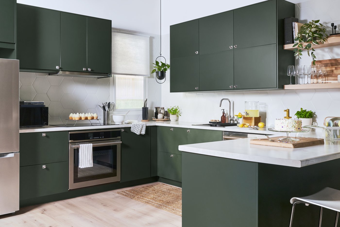 A bamboo/clear glass IKEA 365+ jar with tap