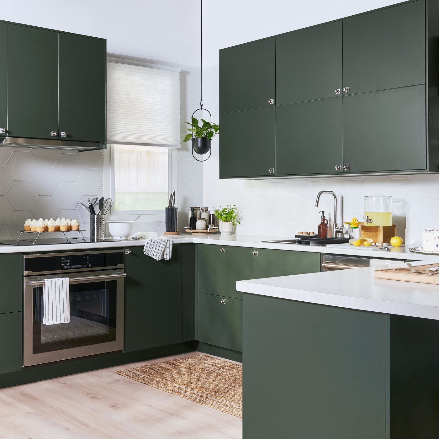 A bamboo/clear glass IKEA 365+ jar with tap