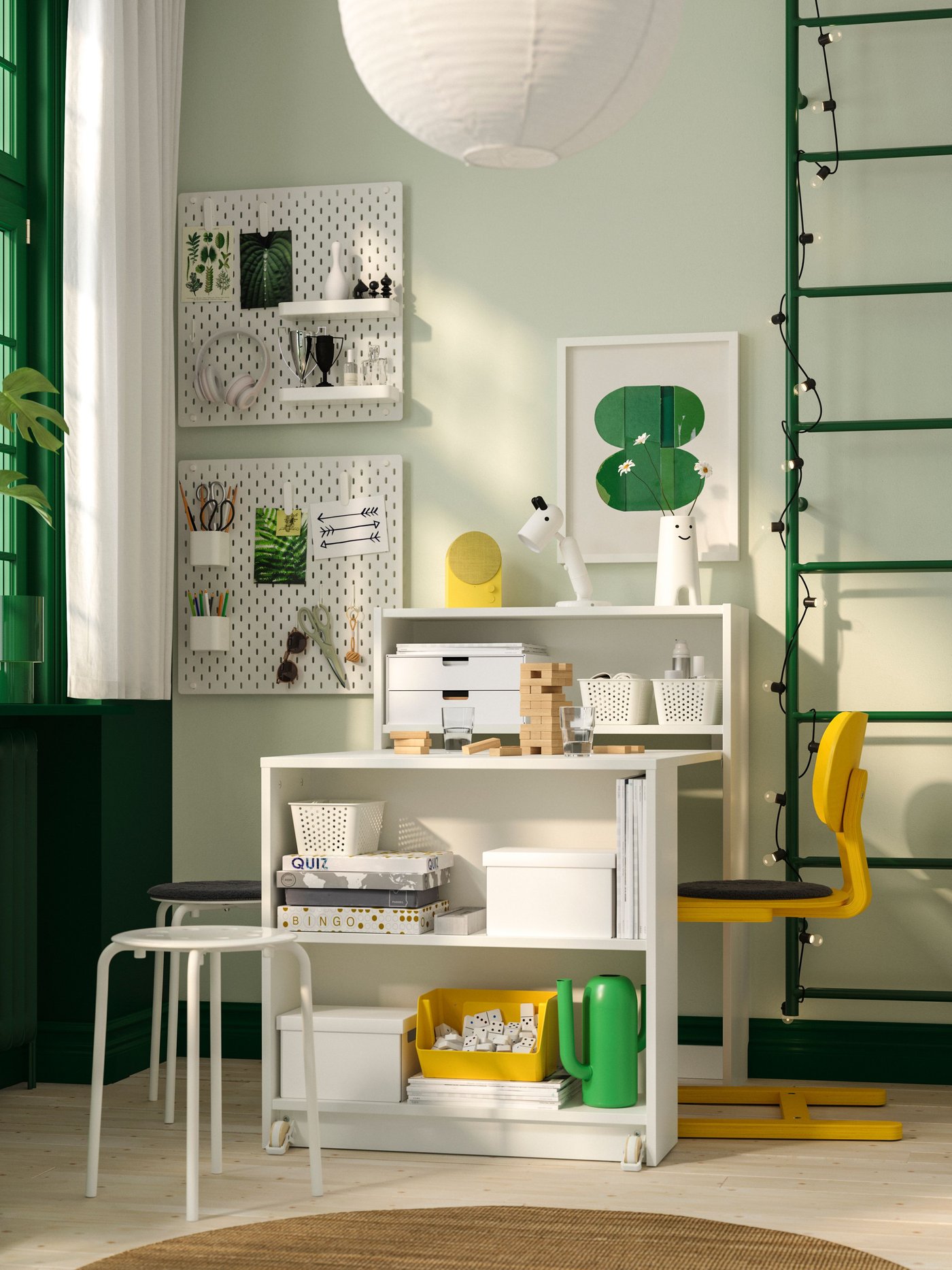 A bright green ÄRTBUSKE vase/watering can