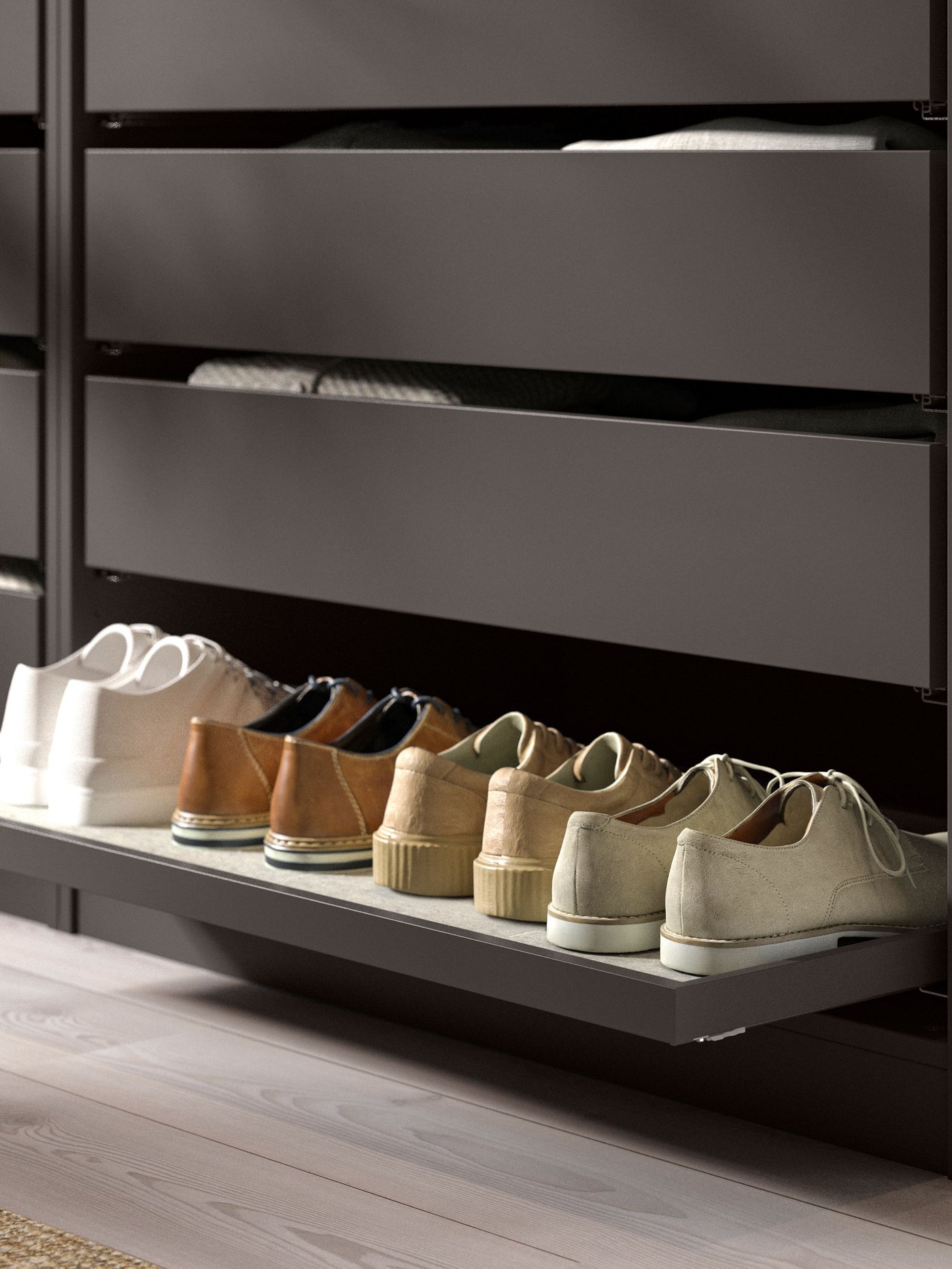 A dark grey KOMPLEMENT pull-out tray