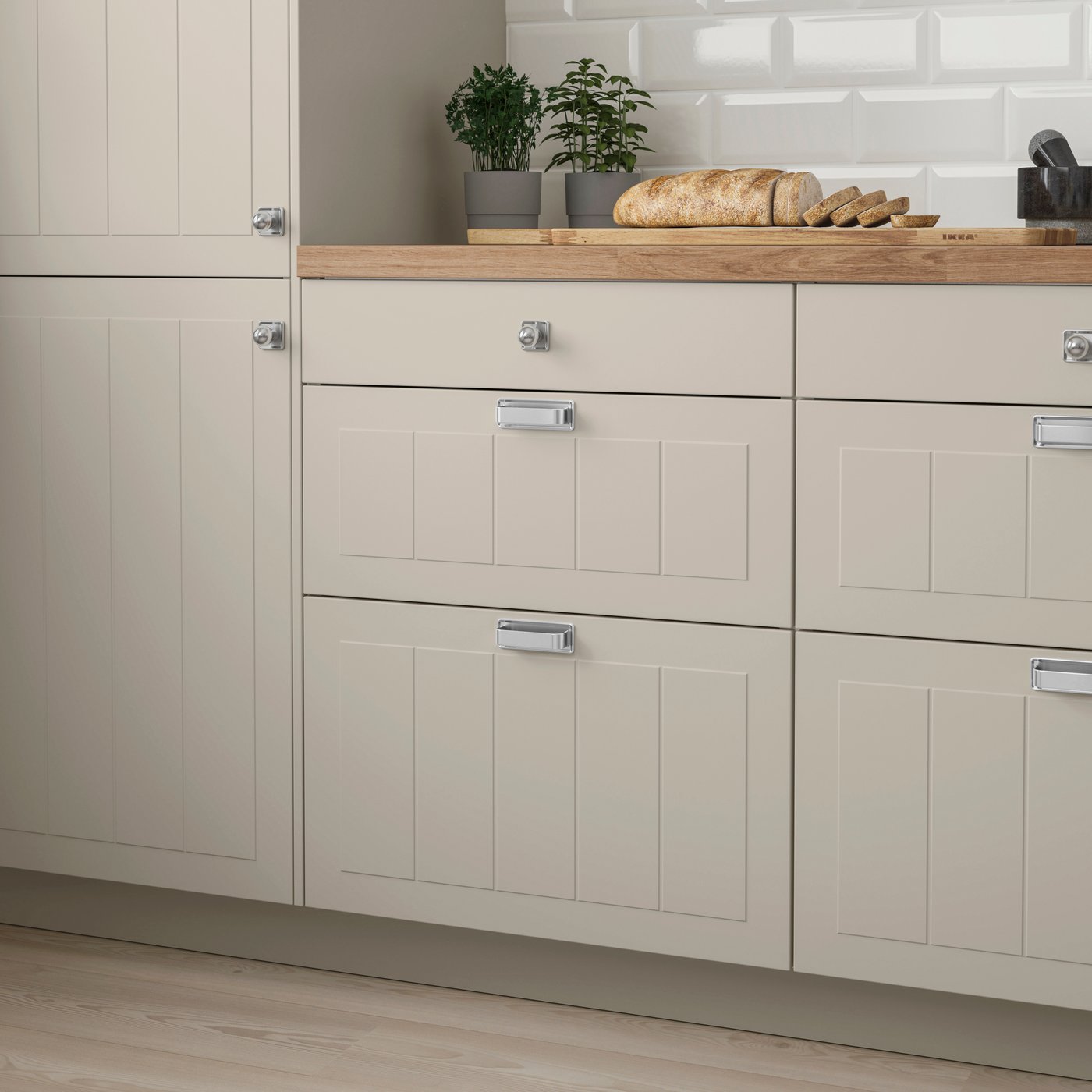 A beige STENSUND drawer front