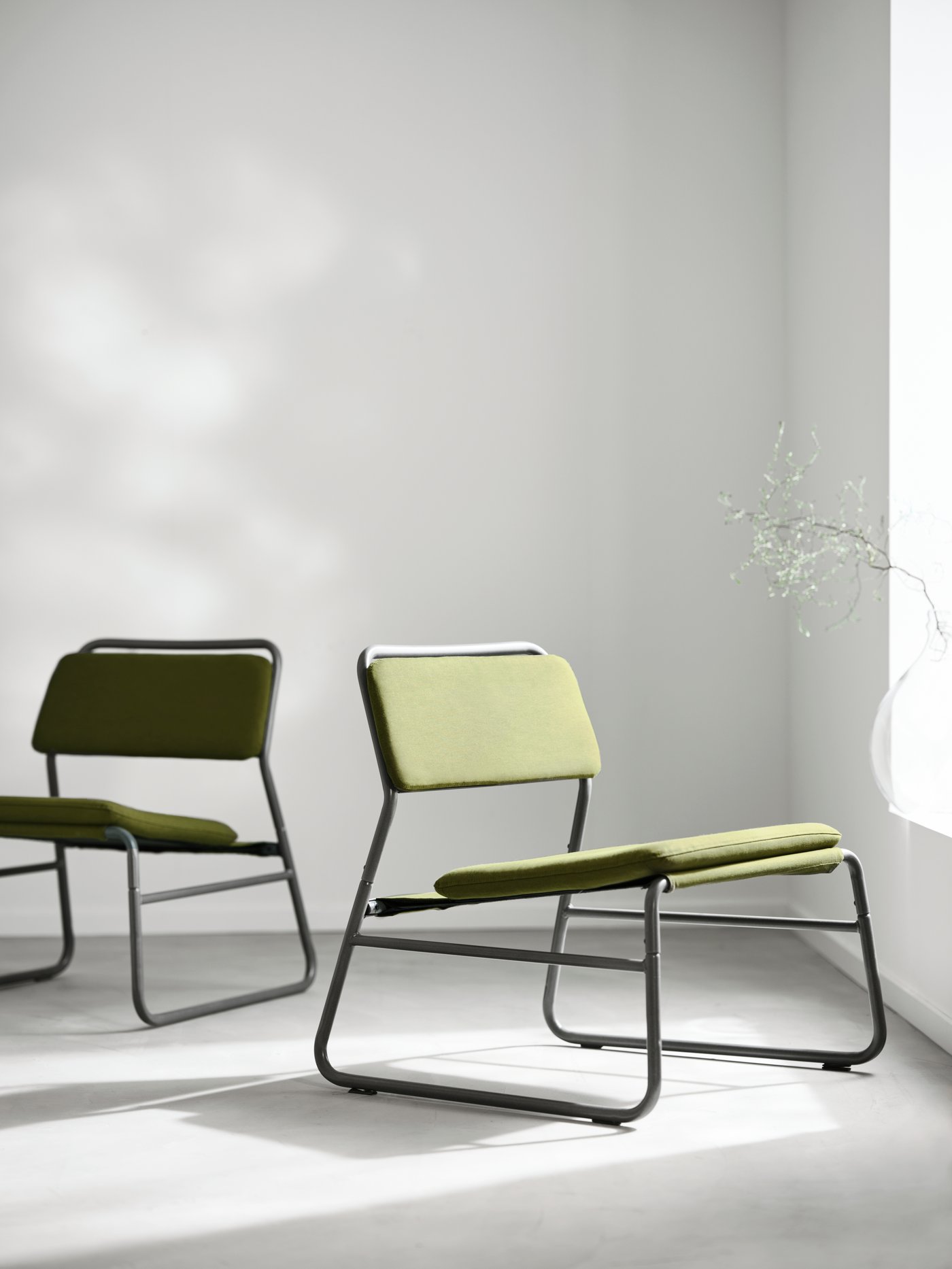 An Orrsta olive-green LINNEBÄCK easy chair