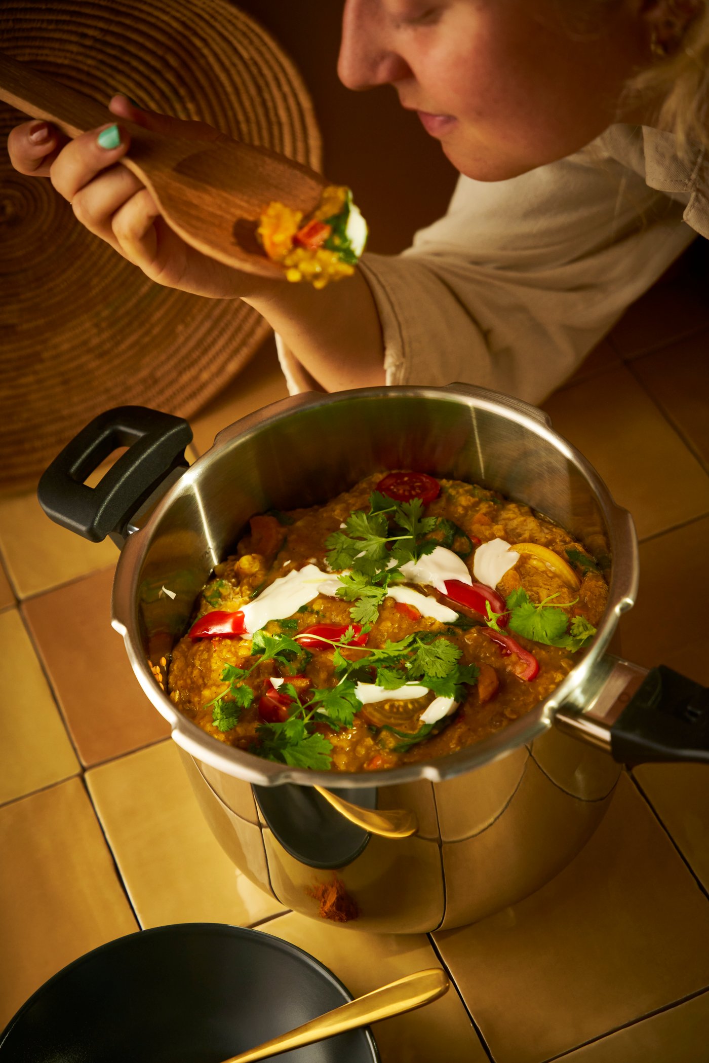 A brass-colour TILLAGD 24-piece cutlery set