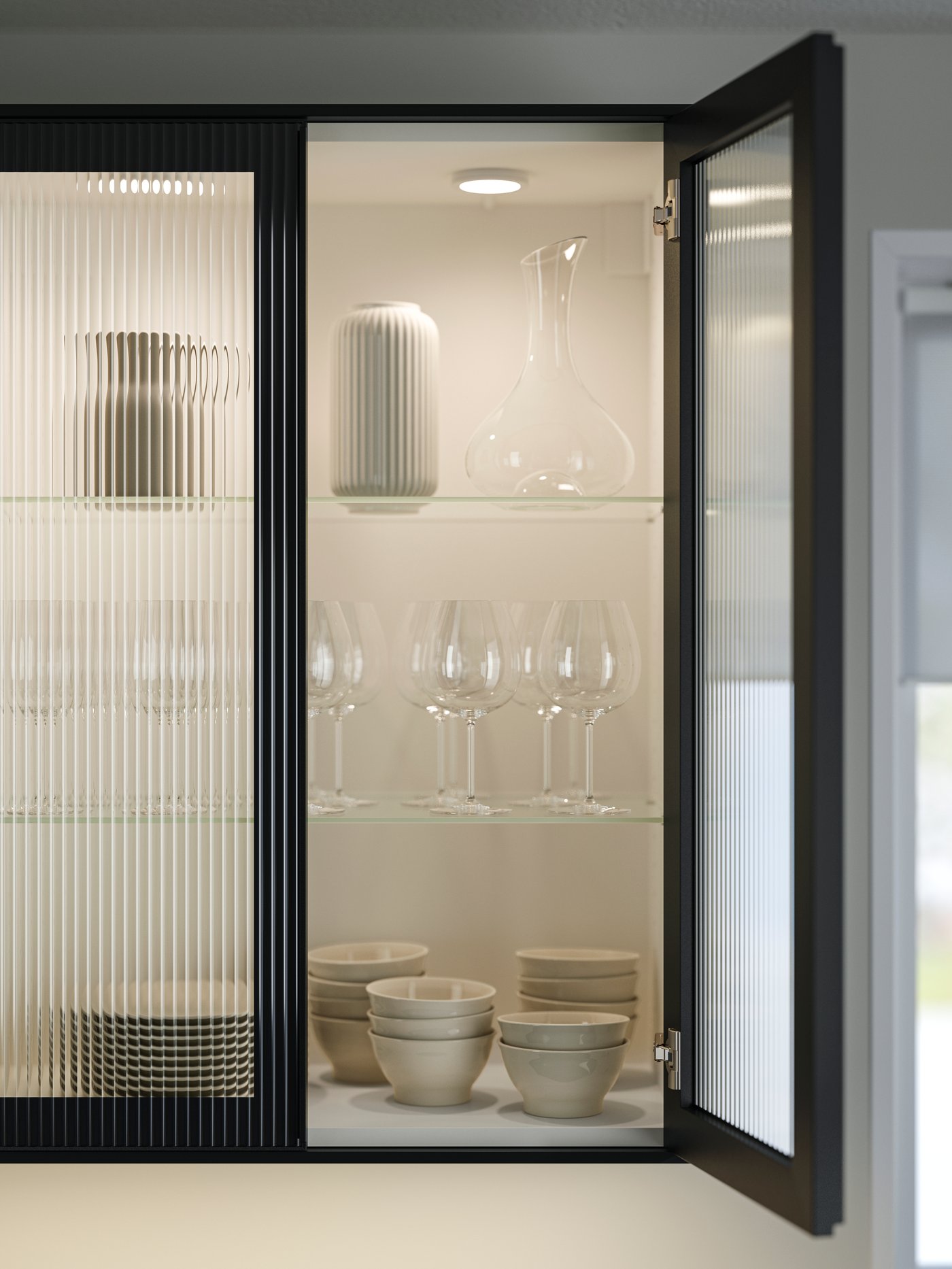 A clear glass STORSINT carafe