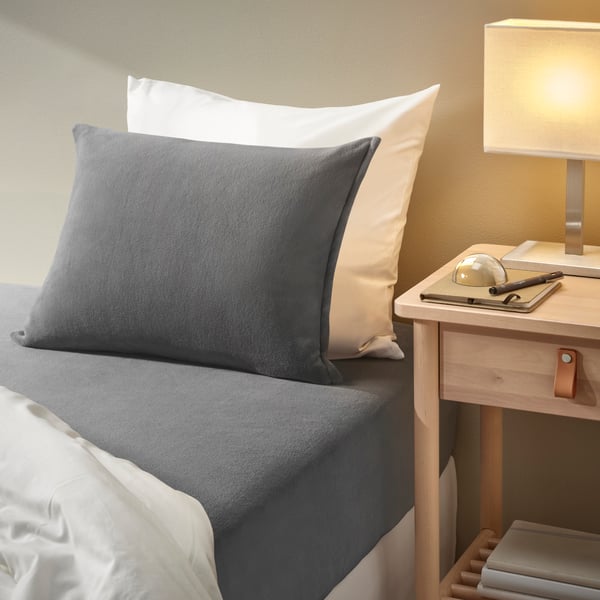 A grey KRANSSALVIA fitted sheet