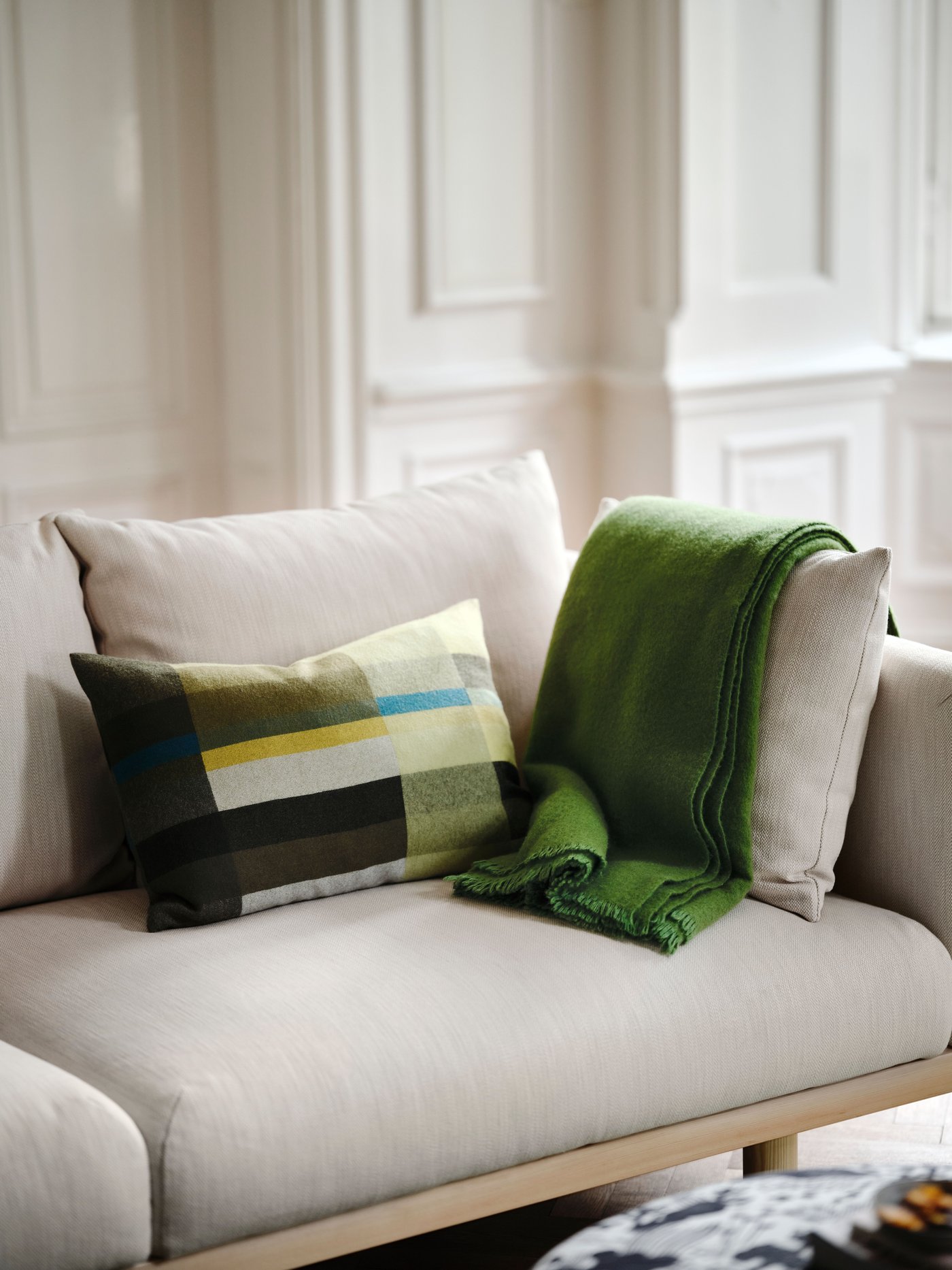 Une housse de coussin vert foncé/bleu-vert STOCKHOLM 2025