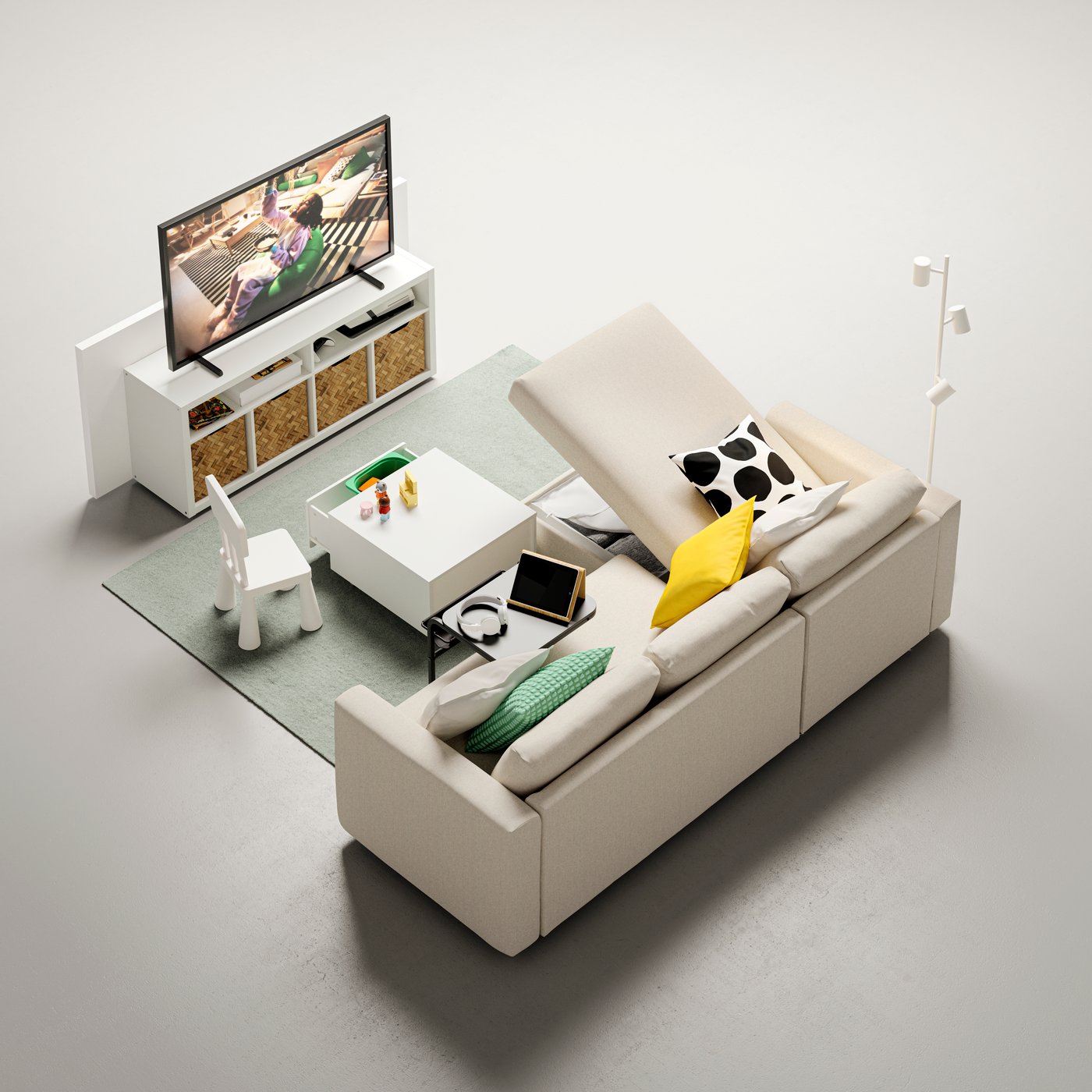 A VIMLE 3-seat sofa with chaise lounge and a SLÄKT storage box with castors stand in front of a TV on a KALAX TV bench.