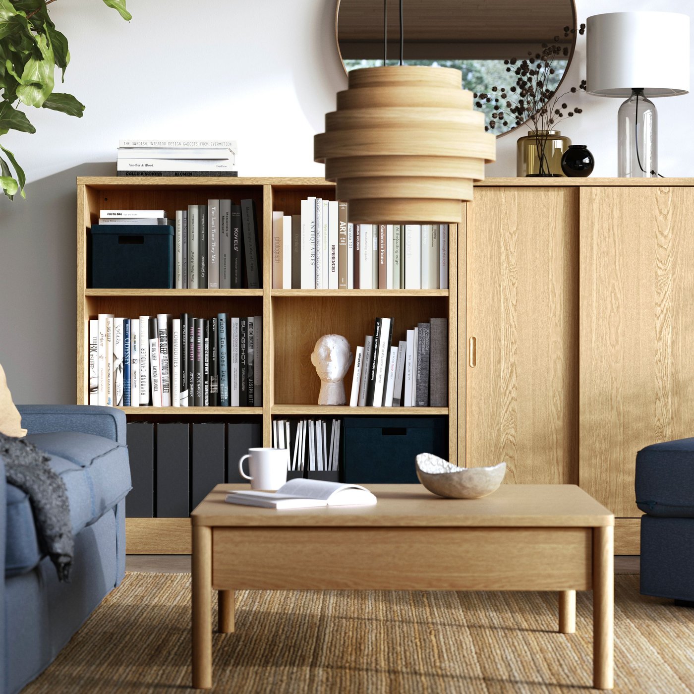 A TONSTAD cabinet in oak veneer with sliding doors