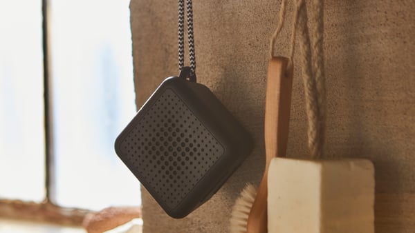 A waterproof/black VAPPEBY portable bluetooth speaker