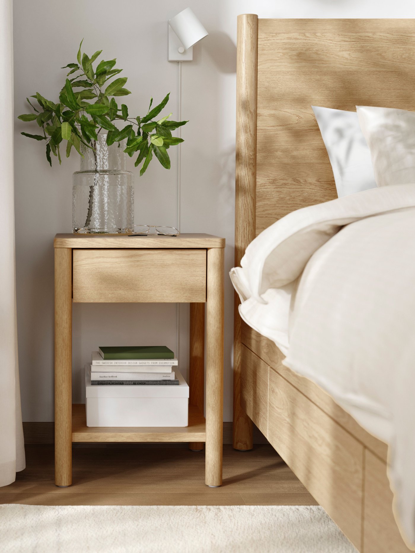 A clear glass/patterned KONSTFULL vase