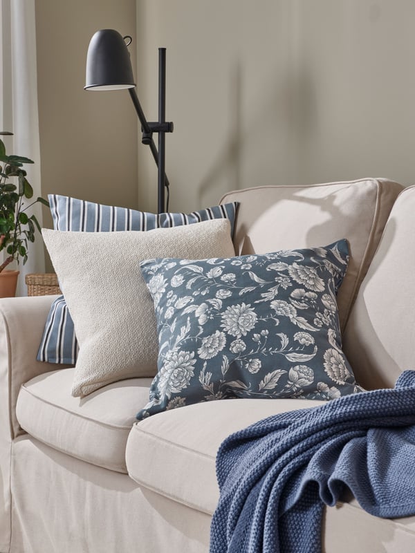 A blue-grey HUMLEMOTT throw