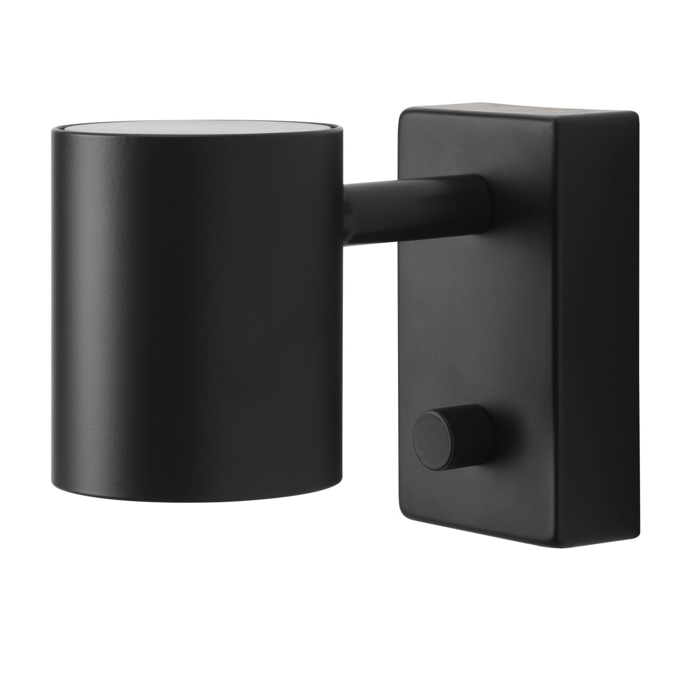 En antracitgrå NYMÅNE væg-/læselampe, tilsluttet med ledning, monteret i NA