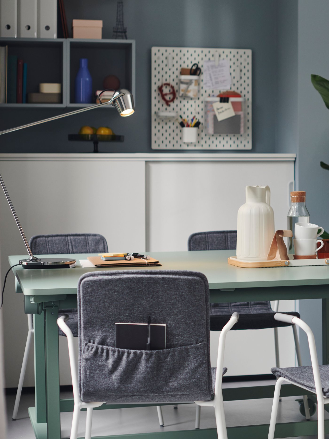A green MITTZON foldable table with castors