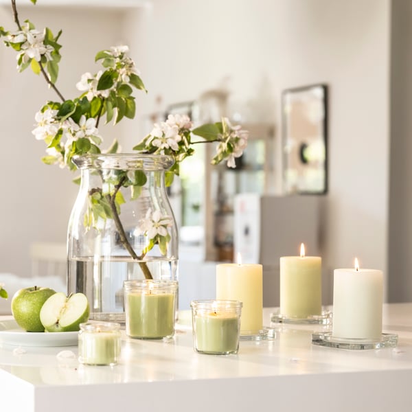 An Apple mixed colours LÖVSKOGSLUND scented pillar candle
