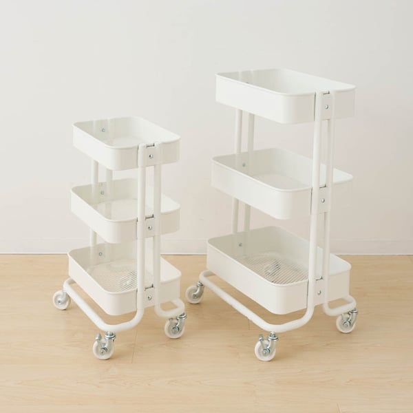 A white RÅSKOG trolley