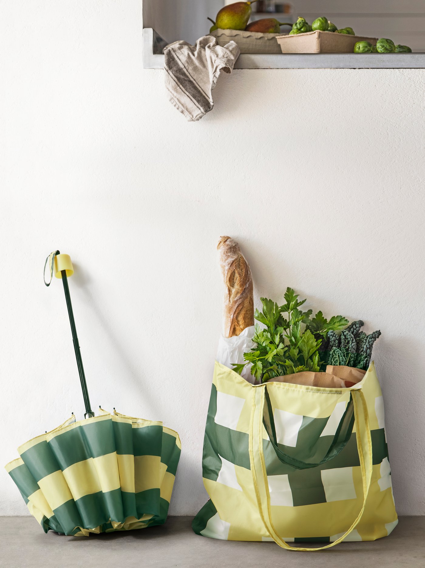 A white/multicolour SKYNKE carrier bag
