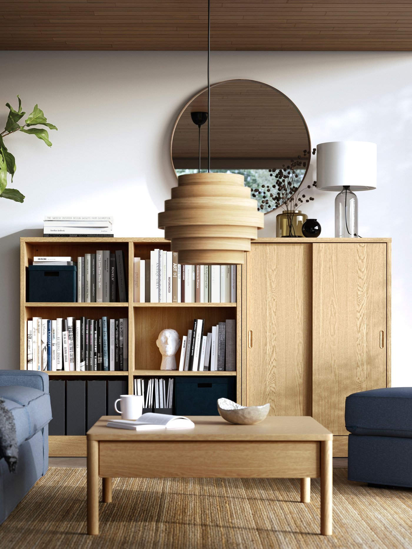 An oak veneer TONSTAD storage combination in the living room