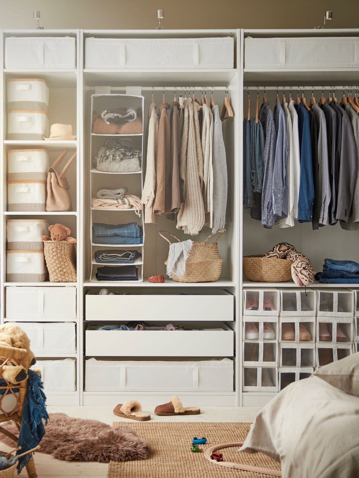 A white SKUBB storage with 6 compartments in the bedroom