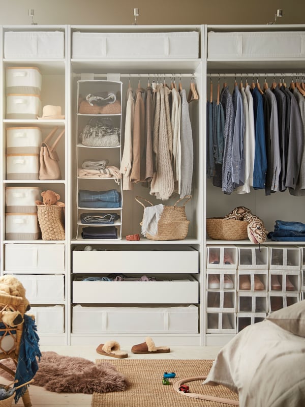 A white SKUBB storage with 6 compartments in the bedroom