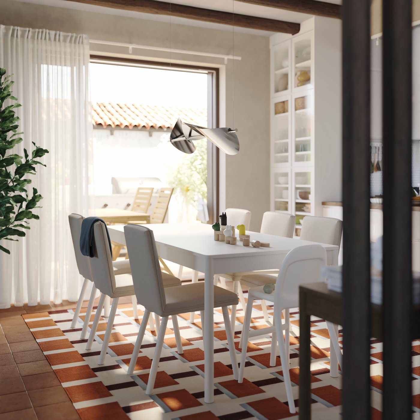 A white VIDGA single track set for wall in the dining room