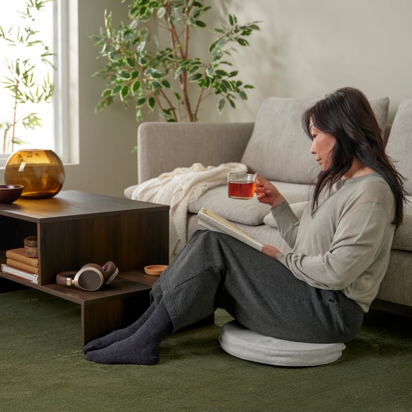 A dark brown HOLMERUD coffee table
