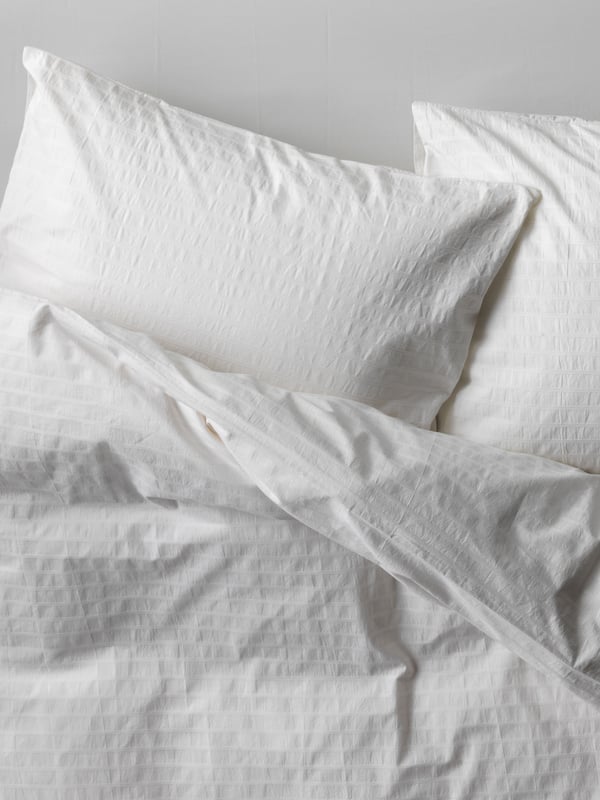 A white OFELIA VASS duvet cover and pillowcase