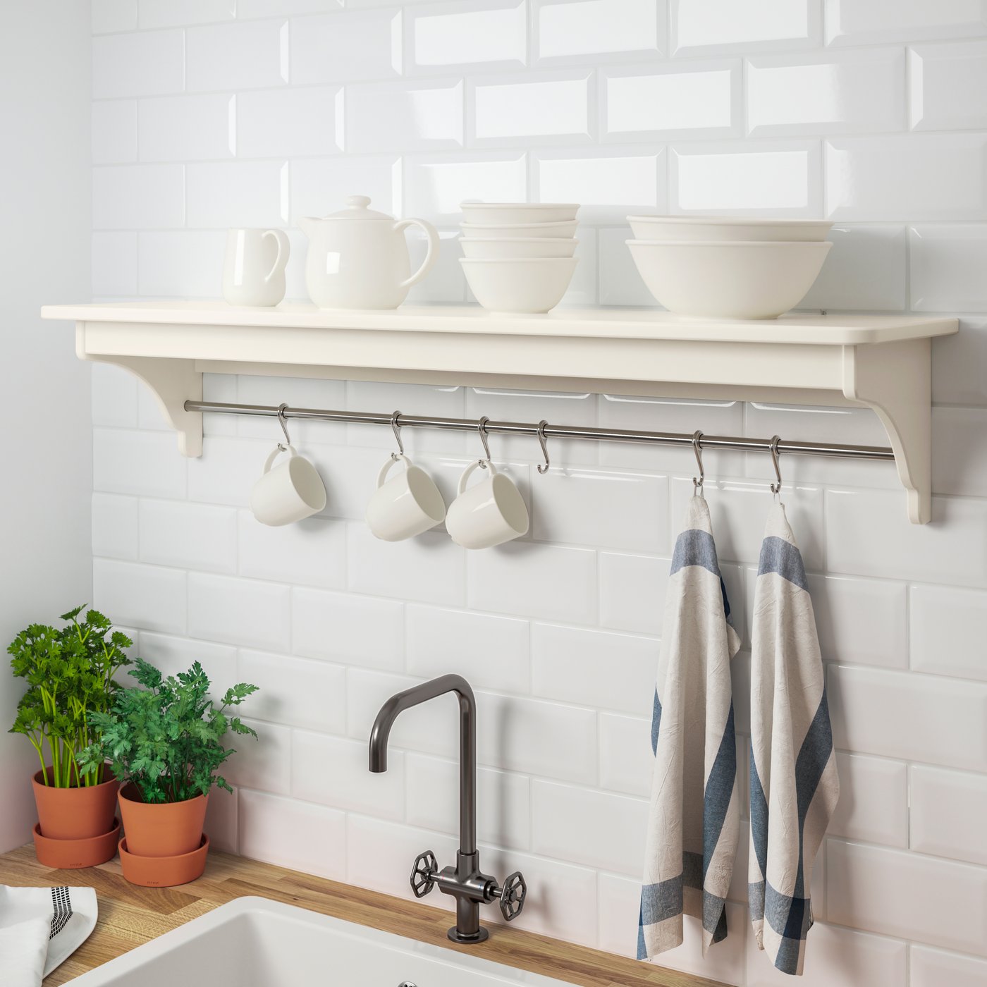 An off-white TORNVIKEN wall shelf