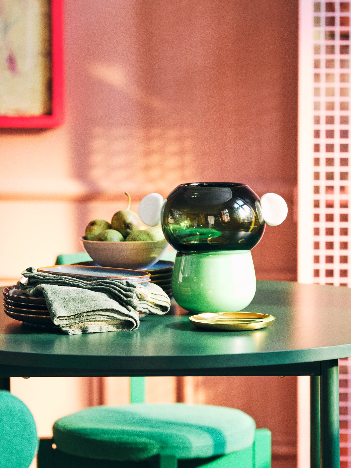 IKEA PS 2026 vase on a green round table.