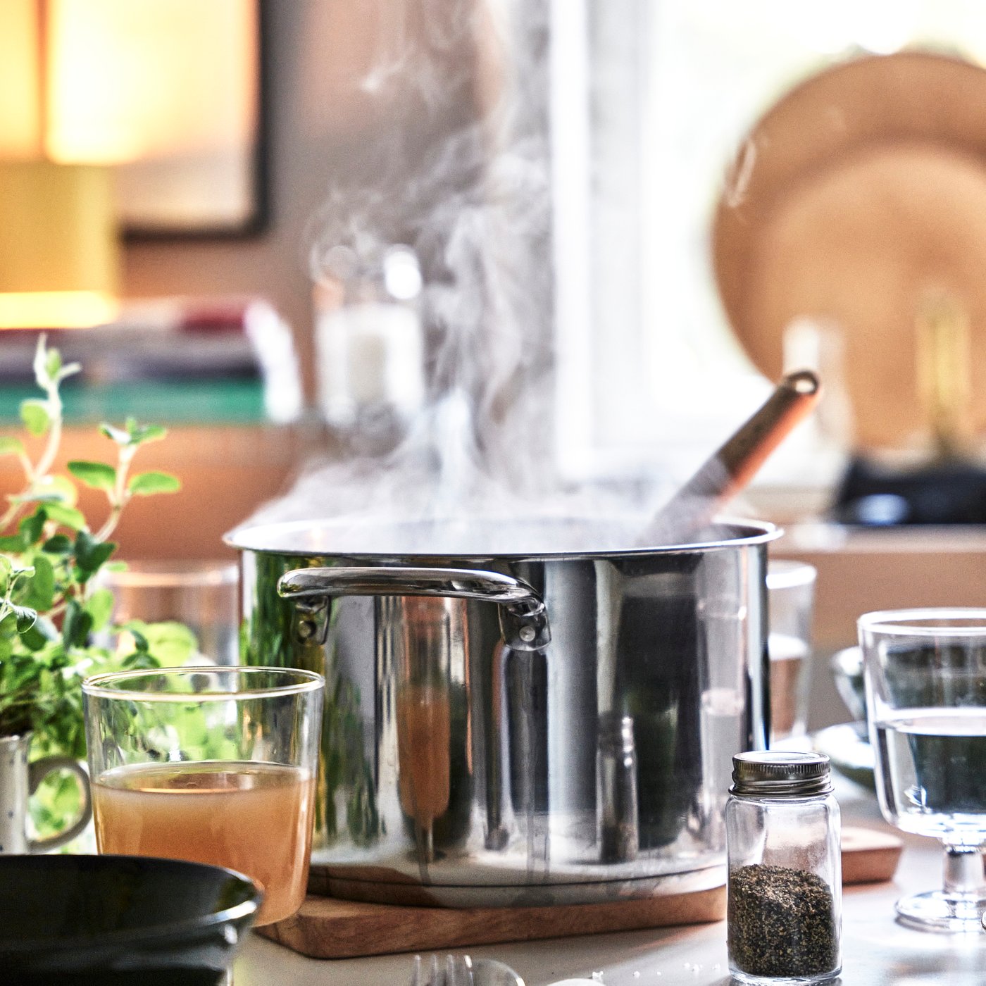 A stainless steel IKEA 365+ pot with lid