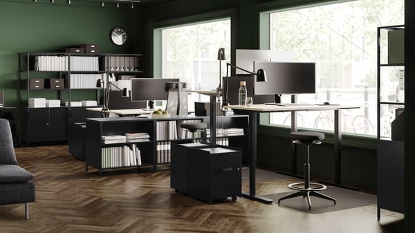 A white/black BEKANT desk