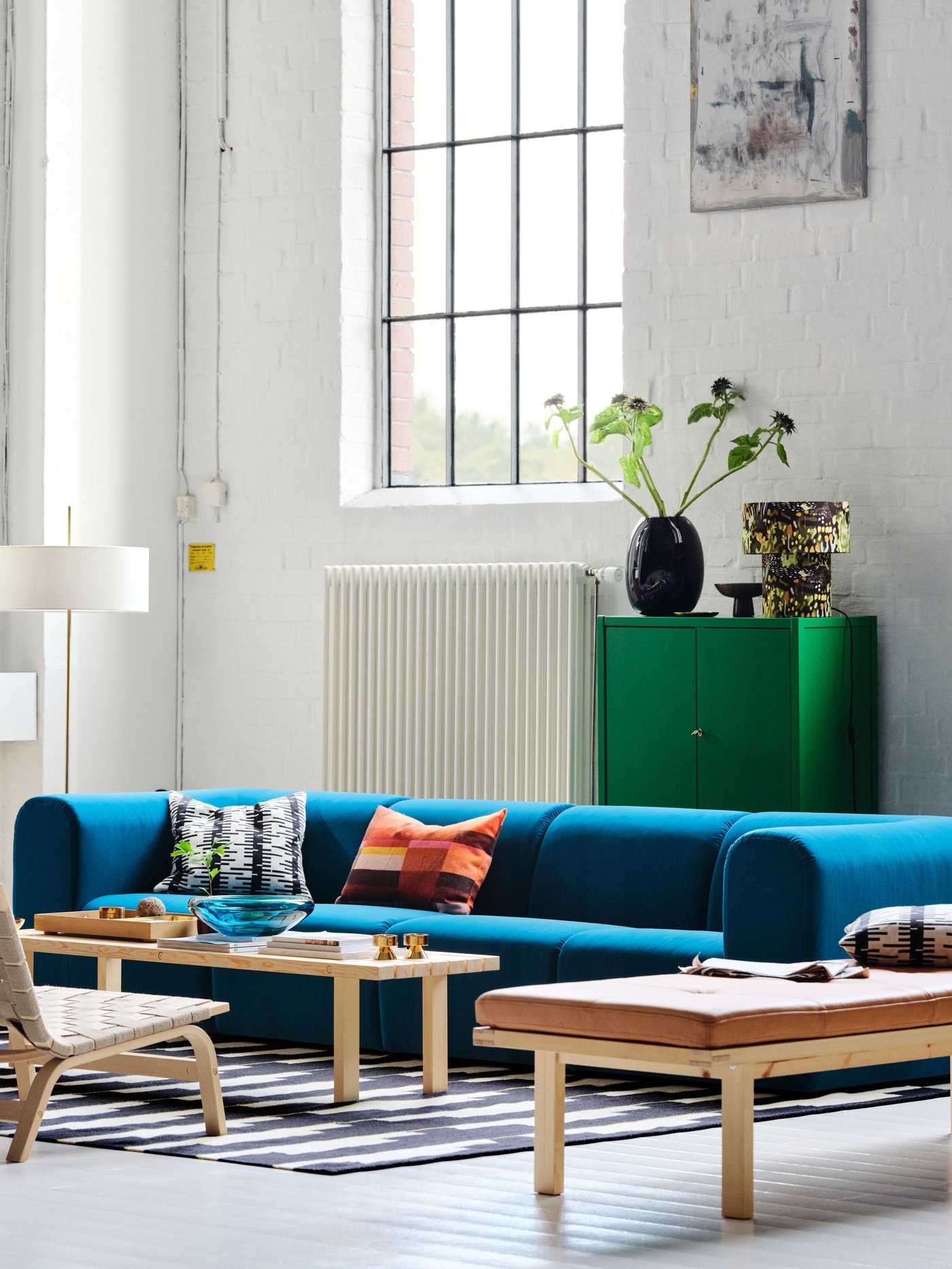 An Alhamn dark turquoise STOCKHOLM 2025 3-seat sofa in the living room