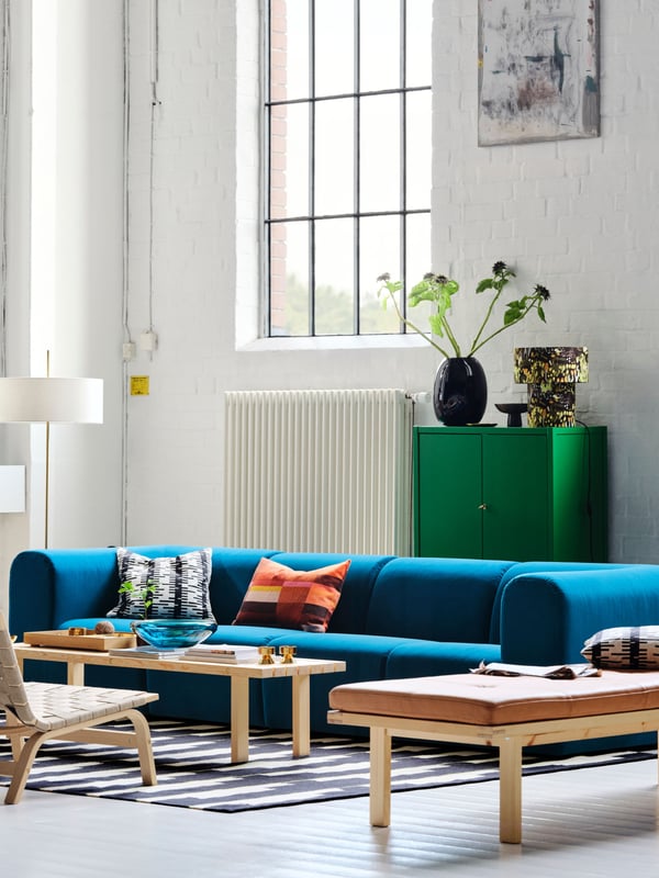 An Alhamn dark turquoise STOCKHOLM 2025 3-seat sofa in the living room