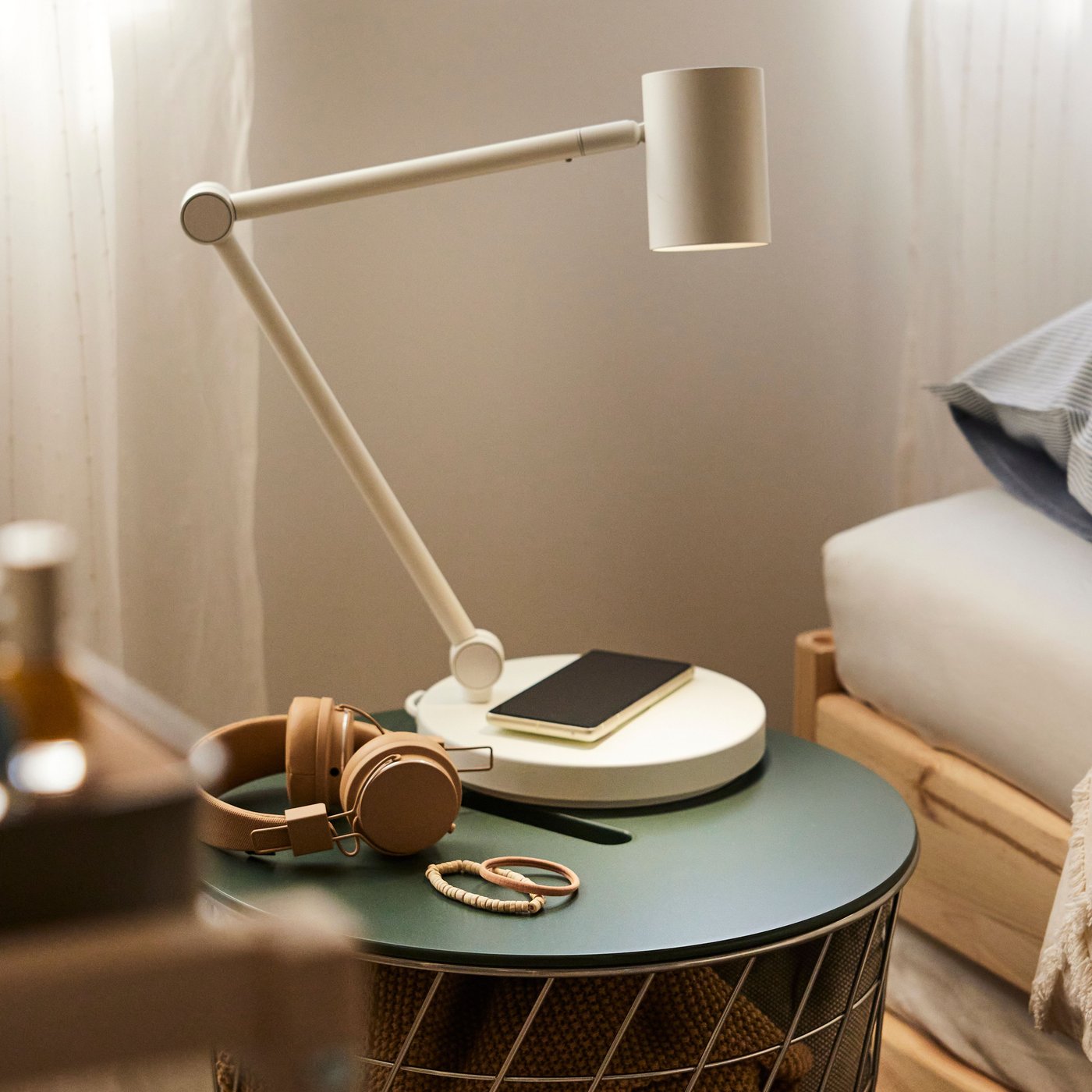 A silver-colour/dark grey-green KVISTBRO storage table