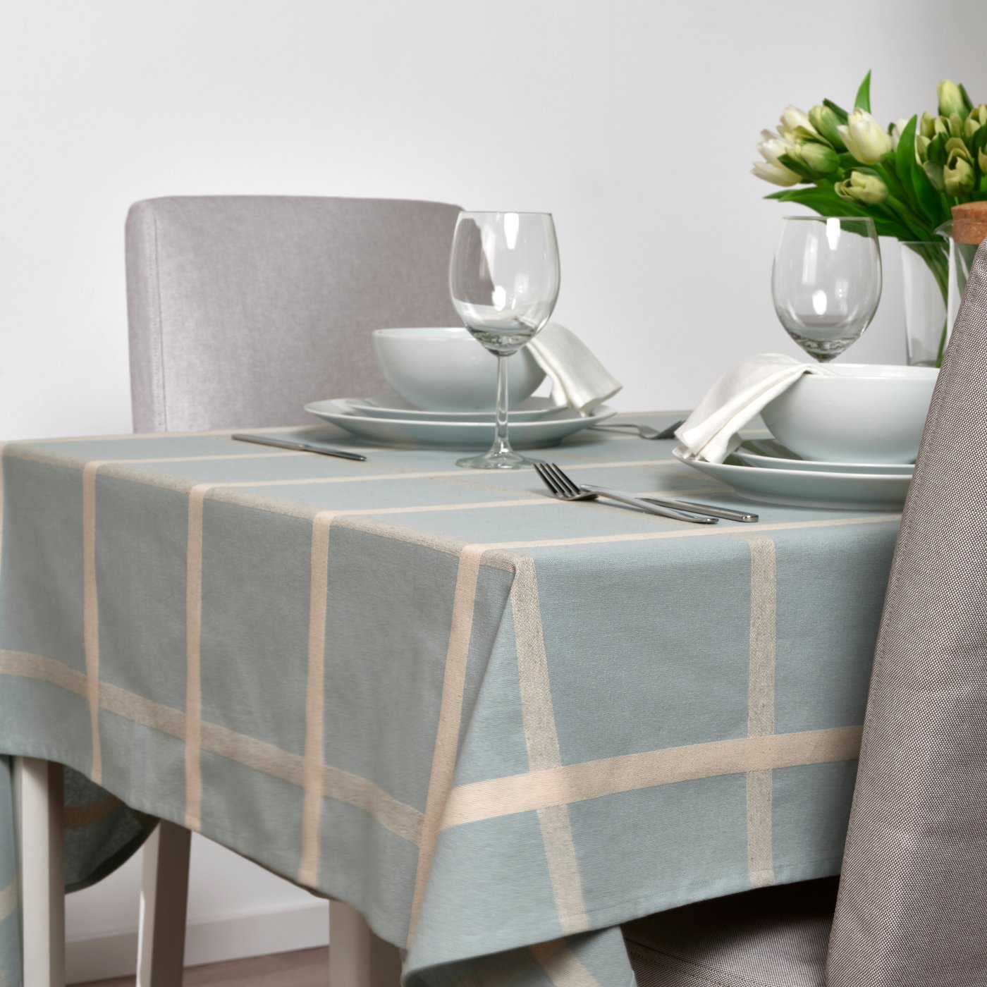 A blue NISSÖGA tablecloth