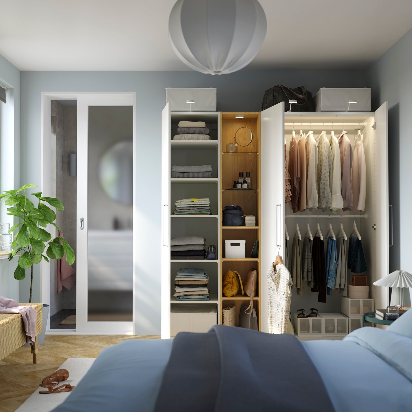 A white white/oak effect PAX wardrobe combination