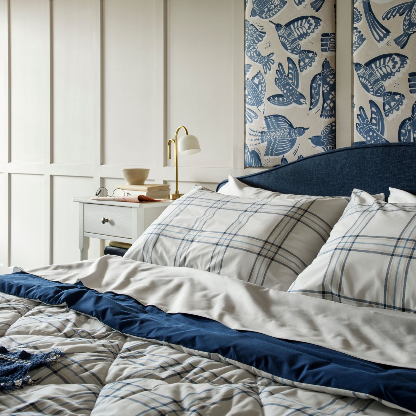A beige/blue/bird pattern BITTERSÖTA pre-cut fabric in the bedroom